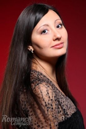 Ukrainian girl Lena,28 years old with brown eyes and dark brown hair.