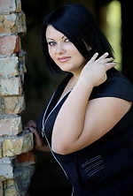 Ukrainian mail order bride Lybov from Nikolaev with black hair and green eye color - image 2