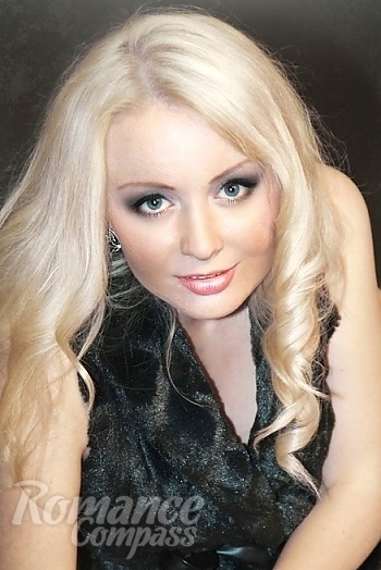 Ukrainian mail order bride Kseniya from Lugansk with blonde hair and blue eye color - image 1