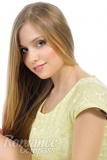 Ukrainian mail order bride Alina from Kiev with light brown hair and blue eye color - image 1