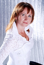 Ukrainian mail order bride Olga from Poltava with light brown hair and blue eye color - image 3