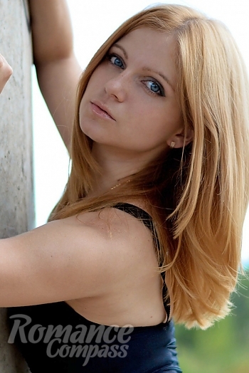 Ukrainian mail order bride Anastasia from Zaporozhye with light brown hair and blue eye color - image 1