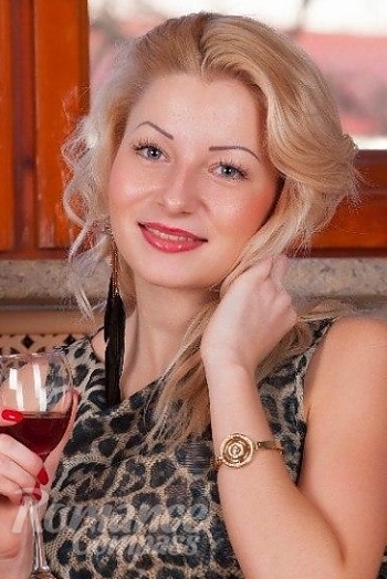 Ukrainian mail order bride Vlada from Lugansk with blonde hair and blue eye color - image 1