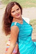 Ukrainian girl Alla,31 years old with blue eyes and black hair.