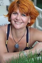 Ukrainian mail order bride Anna from Nikolaev with red hair and green eye color - image 2