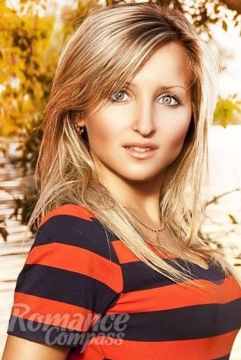 Ukrainian mail order bride Tatiana from Snigiryovka with blonde hair and blue eye color - image 1