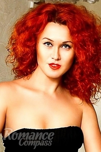 Ukrainian mail order bride Diana from Nikolayev with red hair and grey eye color - image 1