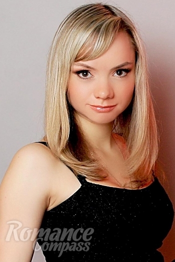 Ukrainian mail order bride Tatiana from Poltava with blonde hair and brown eye color - image 1