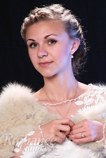 Ukrainian mail order bride Olga from Nikolaev with blonde hair and brown eye color - image 1