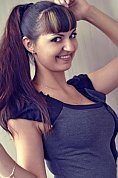 Ukrainian girl Viktoriya,28 years old with brown eyes and black hair.