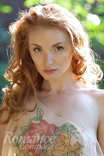Ukrainian mail order bride Anna from Kiev with red hair and green eye color - image 1