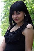 Ukrainian girl Tatiana,20 years old with hazel eyes and black hair.