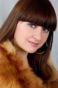 Ukrainian girl Tatiana,22 years old with blue eyes and black hair.