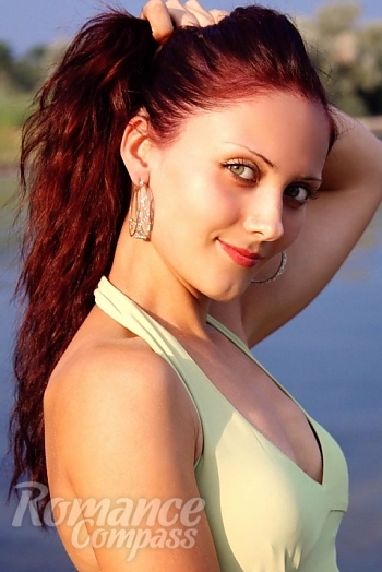 Ukrainian mail order bride Veronika from Nikolaev with black hair and green eye color - image 1