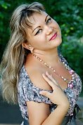Ukrainian girl Elena,35 years old with blue eyes and blonde hair.