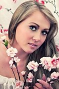 Ukrainian girl Oksana,26 years old with green eyes and light brown hair.
