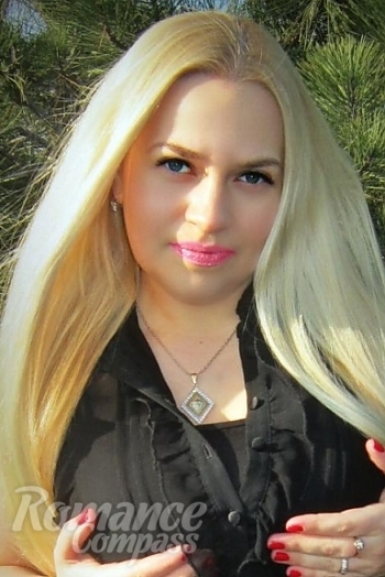 Ukrainian mail order bride Elena from Nikolaev with blonde hair and blue eye color - image 1