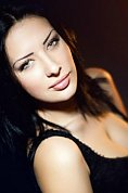 Ukrainian girl Marina,18 years old with green eyes and black hair.