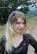 Ukrainian mail order bride Daria from Yalta with light brown hair and blue eye color - image 2