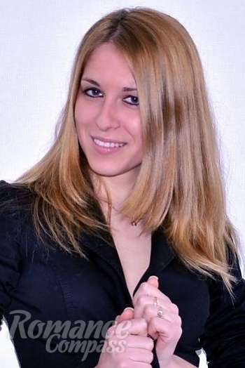 Ukrainian mail order bride Ksenia from Sevastopol with light brown hair and blue eye color - image 1