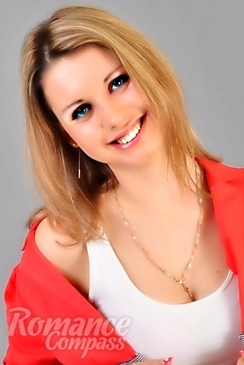 Ukrainian mail order bride Tanya from Nikolaev with blonde hair and green eye color - image 1