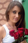 Ukrainian girl Snezhana,19 years old with green eyes and dark brown hair.