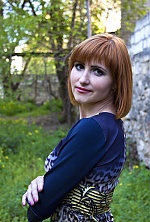 Ukrainian mail order bride Aliona from Nikolaev with red hair and hazel eye color - image 2