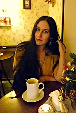 Ukrainian mail order bride Natalia from Berdyansk with black hair and green eye color - image 6