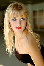 Ukrainian mail order bride Oksana from Nikolaev with blonde hair and blue eye color - image 2