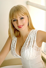 Ukrainian mail order bride Oksana from Nikolaev with blonde hair and blue eye color - image 6
