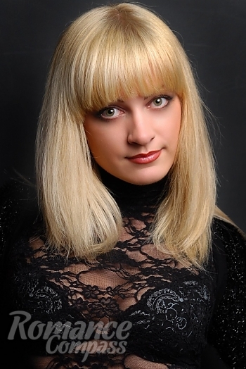 Ukrainian mail order bride Valentina from Kharkov with blonde hair and green eye color - image 1