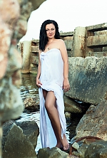 Ukrainian mail order bride Maiia from Yalta with black hair and green eye color - image 4