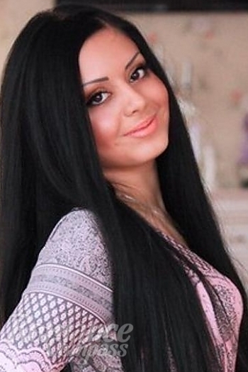 Ukrainian mail order bride Ruslana from Mariupol with black hair and hazel eye color - image 1