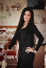 Ukrainian mail order bride Ruslana from Mariupol with black hair and hazel eye color - image 5