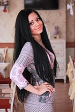 Ukrainian mail order bride Ruslana from Mariupol with black hair and hazel eye color - image 4