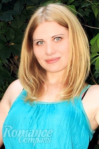 Ukrainian mail order bride Anastasia from Nikolaev with blonde hair and blue eye color - image 1