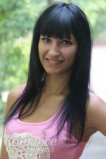 Ukrainian mail order bride Yana from Zaporozhye with black hair and green eye color - image 1