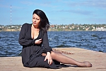Ukrainian mail order bride Julia from Nikolaev with black hair and green eye color - image 3