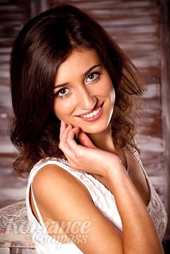 Ukrainian mail order bride Victoria from Kharkov with light brown hair and hazel eye color - image 1