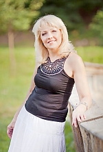 Ukrainian mail order bride Svetlana from Poltava with blonde hair and grey eye color - image 2