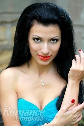 Ukrainian mail order bride Zhanna from Nikolaev with black hair and brown eye color - image 1
