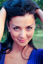 Ukrainian mail order bride Marina from Rovno with black hair and green eye color - image 2