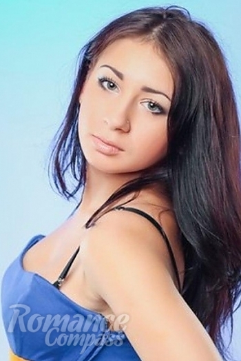 Ukrainian mail order bride Julianiya from Nikolaev with black hair and green eye color - image 1