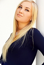 Ukrainian mail order bride Anastasia from Kiev with blonde hair and blue eye color - image 7