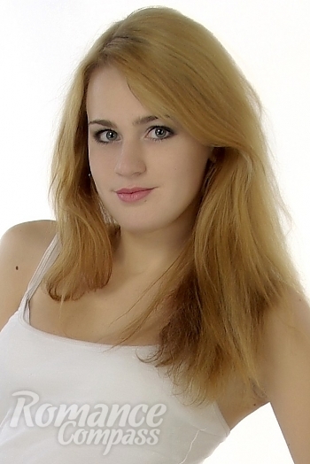 Ukrainian mail order bride Julianna from Kiev with red hair and green eye color - image 1