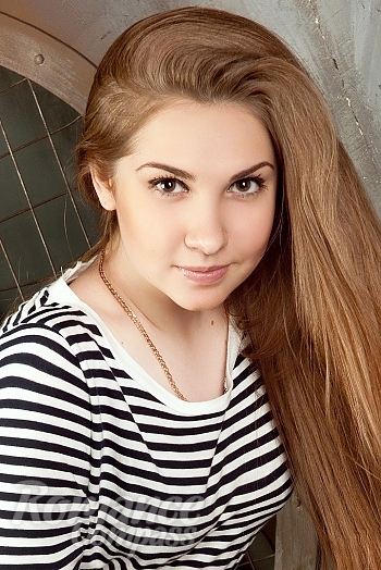 Ukrainian mail order bride Ulyana from Kharkiv with light brown hair and brown eye color - image 1