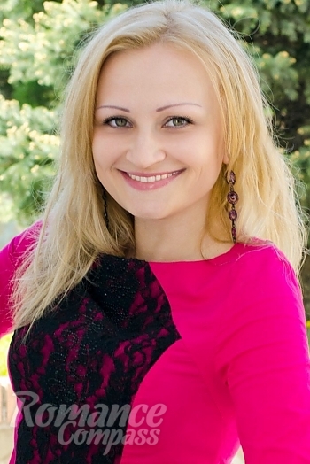 Ukrainian mail order bride Nikitina from Donetsk with blonde hair and green eye color - image 1