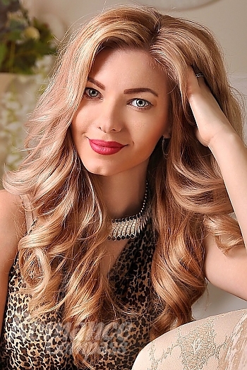 Ukrainian mail order bride Elena from Dnipro with light brown hair and green eye color - image 1