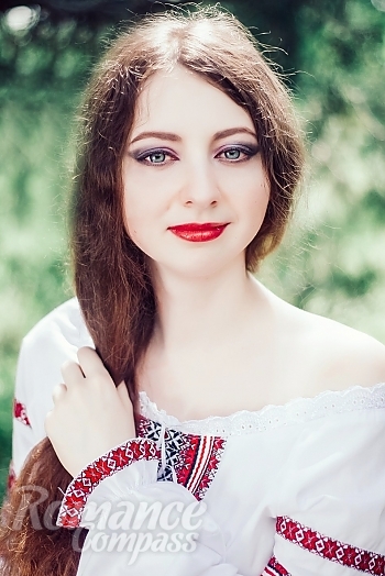 Ukrainian mail order bride Anna from Kherson with light brown hair and blue eye color - image 1