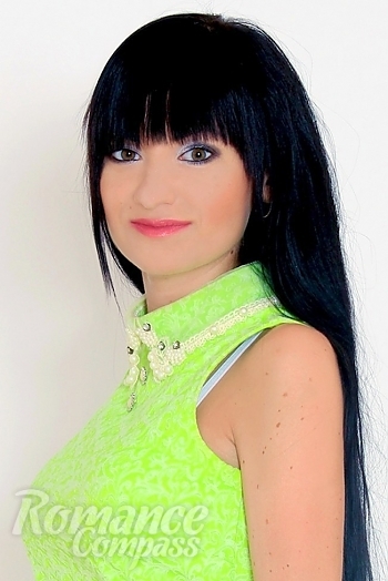 Ukrainian mail order bride Ekaterina from Nikolaev with black hair and green eye color - image 1
